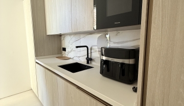 Resa Estates Can Furnet Ibiza te koop sale modern villa sea dalt villa views second kitchen.jpeg